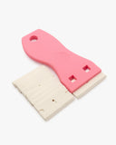 Herramienta raspadora ergonómica para quitar cinta y pegatinas en superficies lisas